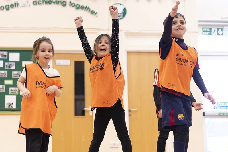 Curricular Primary School Sports Coaching Primary school pupils taking part in in-curricular PE coaching with Game On Sports Coaching during the school day